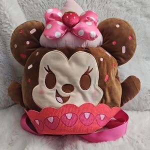 Brown and Pink Stuffed Animal with Bow and Heart Patterns